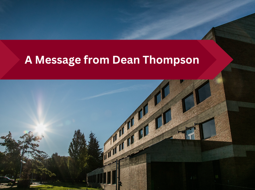 A message from Dean Thompson text on banner with photo of Brooks Library and blue skies in background